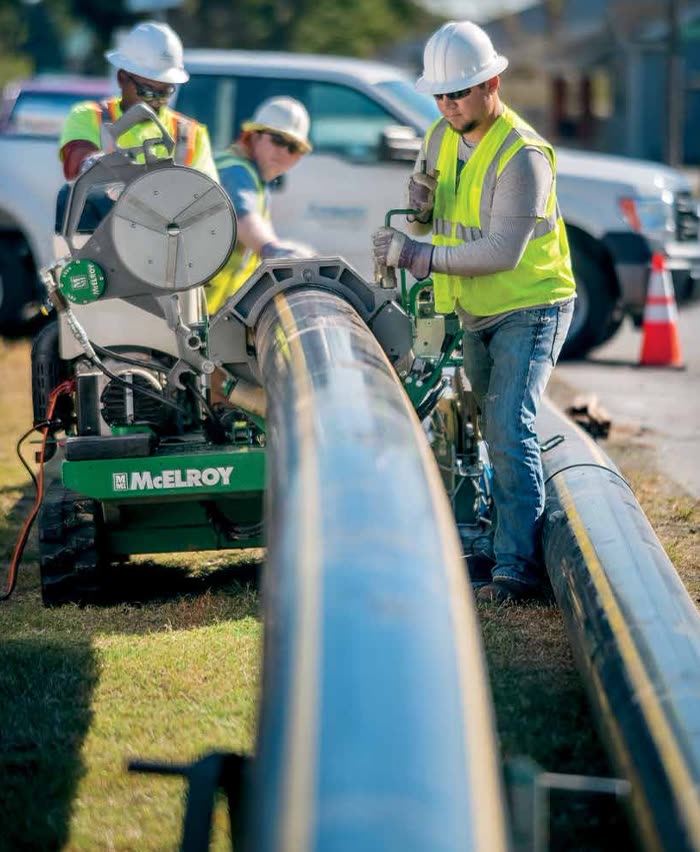 Crew fusing a natural gas gathering line in the field